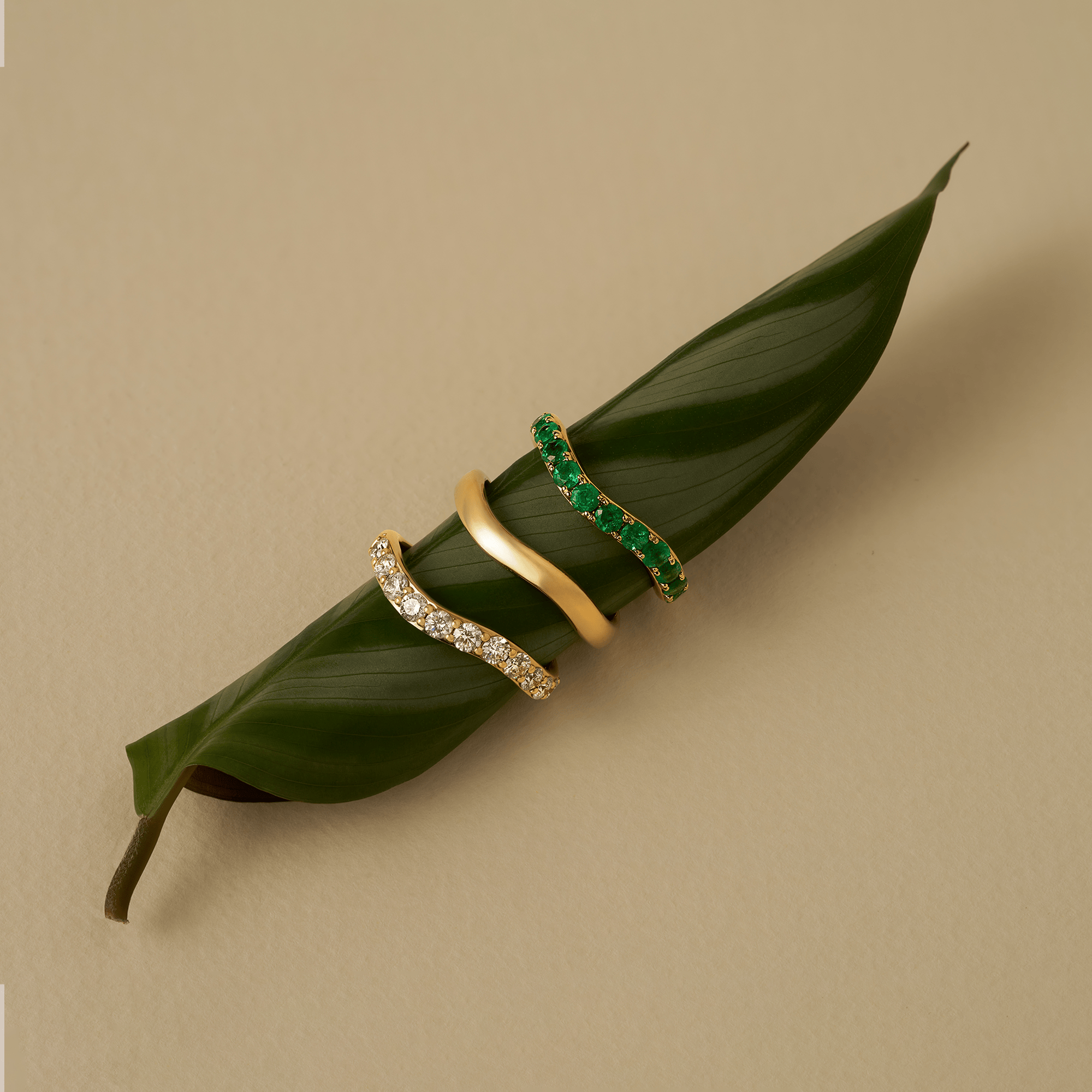 0.69 Carat Emerald Wave Ring in 18ct Yellow Gold