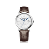 Front-facing view of the Baume & Mercier Classima M0A10214 men's watch, featuring an opaline silver dial with line guilloché décor, Roman numerals, blued steel hands, date window at 3 o'clock, polished stainless steel case, and a dark brown alligator leather strap.