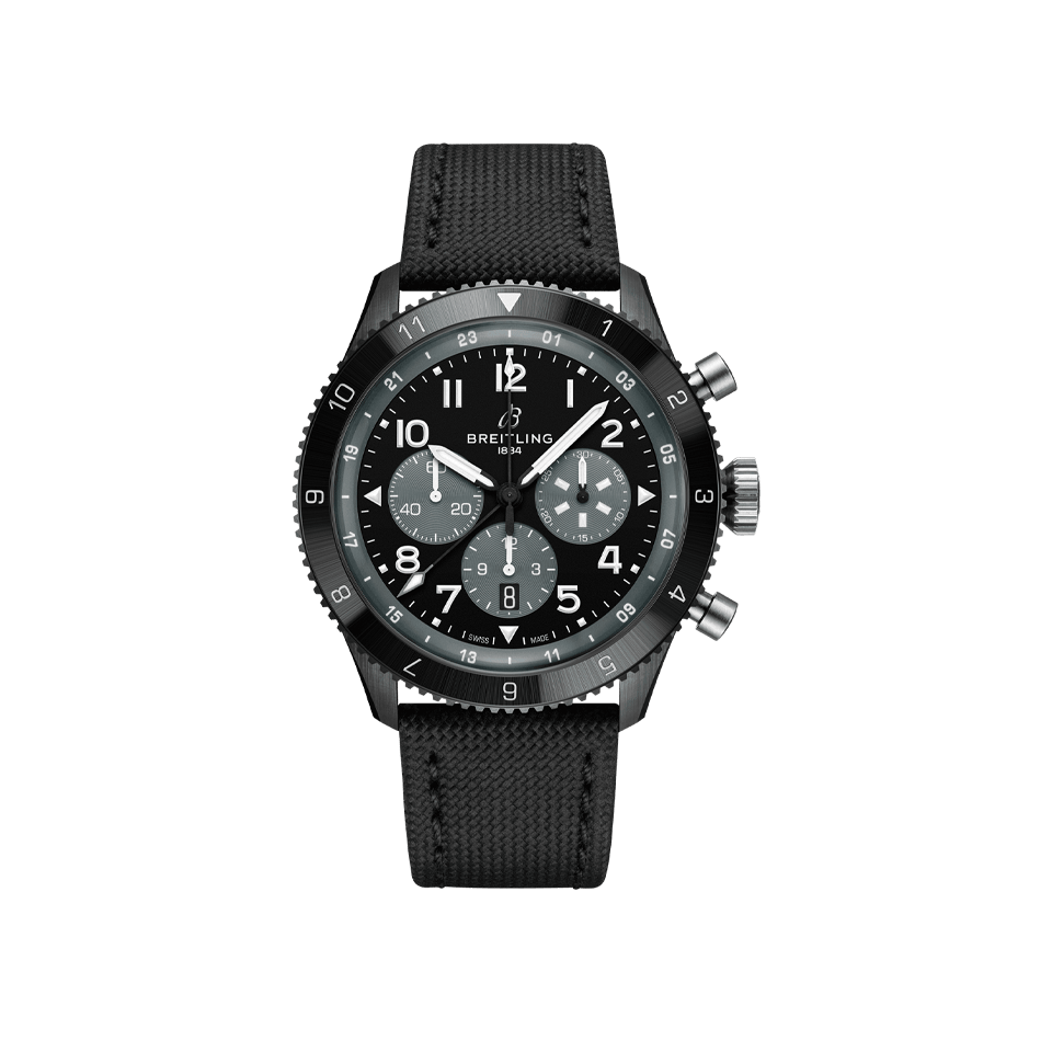 Breitling Super AVI B04 Chronograph GMT 46mm Watch SB04451A1B1X1 displays its black dial with large, legible Arabic numerals and a white-tipped GMT hand for second timezone tracking. The all-black ceramic case is inspired by the de Havilland Mosquito Night Fighter's stealth livery.Jewellers