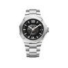 Front-facing view of the Baume & Mercier Riviera M0A10702 men's watch, featuring a transparent smoked grey dial revealing the in-house Baumatic movement beneath, rhodium-plated dauphine hands, date window at 3 o'clock, polished twelve-sided stainless steel case with four-screw bezel, and a matching integrated polished and satin-finished stainless steel bracelet.