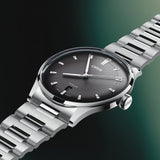 Oris Artelier Date Automatic 38mm Watch 01 733 7810 4054-07 8 20 20 — Viewed at a three-quarter angle, the multi-piece stainless steel case and matching bracelet show the watch's taut, contemporary silhouette.
