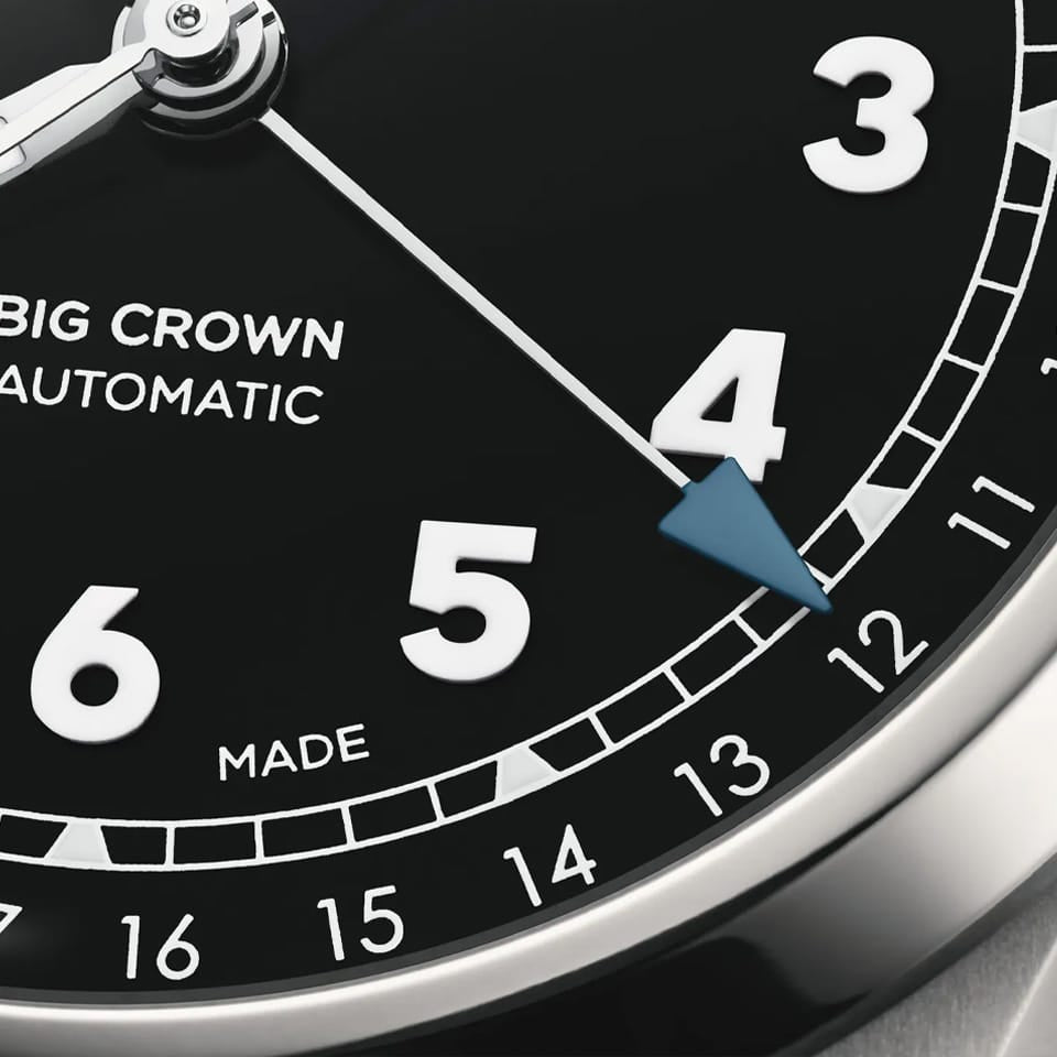 Oris Big Crown Pointer Date Automatic 40mm Watch 01 754 7798 4064-07 8 20 06 — A close-up shows the blue pointer date hand against the black dial, with the domed sapphire crystal's anti-reflective coating visible.