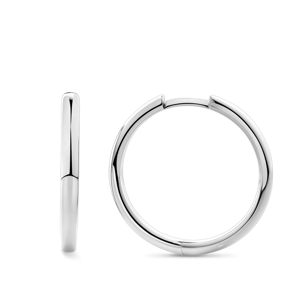 Quintessential Hoop Earrings in 18ct white gold from Hardy Brothers Jewellers, shown side-on to highlight the rounded hoop profile.