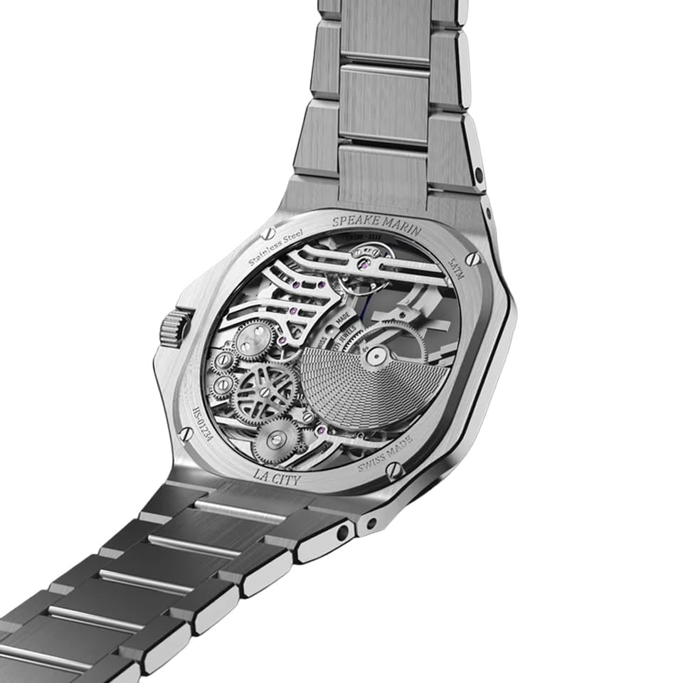 Sapphire case back of the Speake Marin Ripples Skeleton Automatic 40.30mm Watch 604020150, revealing the in-house SMA07 self-winding skeleton calibre. The tungsten micro-rotor carries the Maison's exclusive embossed motif above rhodium-plated, bevelled bridges.