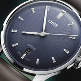 Oris Artelier Date Automatic 38mm Watch 01 733 7810 4055-07 6 20 17FC — A close-up shows the clean baton hour markers and date window against the blue dial's uncluttered surface.