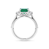 1.62 Carat Emerald and 0.40 Carat TW Diamond Trilogy Ring in 18ct White Gold — Viewed from the front, the ring showcases its trilogy design with the emerald-cut emerald set above matching emerald-cut diamonds on either side. The 18ct white gold setting frames the stones in a bright, cool tone.