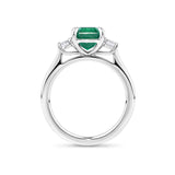 1.81 Carat Emerald and 0.30 Carat TW Diamond Trilogy Ring in 18ct White Gold — Viewed from the front, the ring showcases its trilogy design with the emerald-cut emerald set above matching emerald-cut diamonds on either side. The 18ct white gold setting frames the stones in a bright, cool tone.