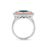 7.66 Carat Sapphire and 1.04 Carat TW Diamond Halo Ring in 18ct Rose and White Gold — Viewed from the front, the ring showcases its double halo design with the cushion-cut sapphire framed by rose gold-set pink diamonds and an outer white gold-set diamond halo. The two-tone setting creates a striking contrast.