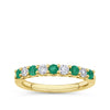 Emerald and Diamond Alternating Ring in 18ct yellow gold from Hardy Brothers Jewellers, shown front-on with its alternating emerald and diamond row.