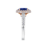 2.50 Carat Sapphire and 0.70 Carat TW Diamond Halo Ring in 18ct Rose and White Gold — This side profile highlights the ring's intricate rose gold basket detailing and the natural diamonds set along the tapered white gold shoulders. The two-tone setting maintains an elegant silhouette from every angle.