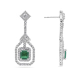 Close-up detail of the Emerald and Diamond Drop Earrings in 18ct white gold by Hardy Brothers, highlighting the emerald cut emerald and double diamond halo.