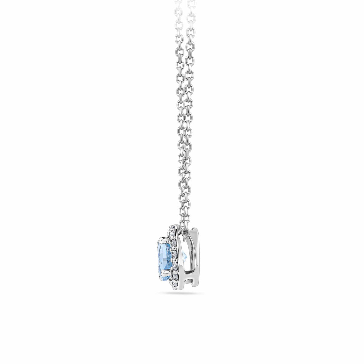 Close-up detail of the Aquamarine and Diamond Halo Pendant in 18ct white gold by Hardy Brothers, highlighting the round aquamarine and diamond halo setting.