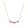 Close-up detail of the Elysian Diamond, Ruby and Tourmaline Cluster Necklace in 18ct yellow gold by Hardy Brothers, highlighting the pink tourmaline, ruby and diamond cluster.