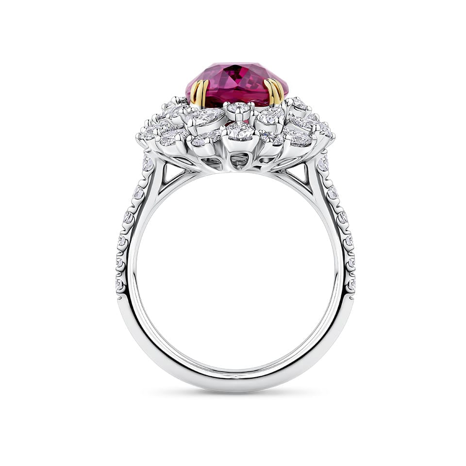 VAULT® 6.09 Carat TW Oval Cut Ruby and 2.44 Carat TW Diamond Halo Ring in 18ct Yellow and White Gold