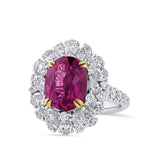 VAULT® 6.09 Carat TW Oval Cut Ruby and 2.44 Carat TW Diamond Halo Ring in 18ct Yellow and White Gold