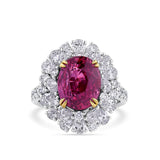 VAULT® 6.09 Carat TW Oval Cut Ruby and 2.44 Carat TW Diamond Halo Ring in 18ct Yellow and White Gold