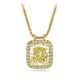 3.01 Carat Fancy Yellow Diamond and 0.28 Carat TW Diamond Pendant in 18ct Yellow Gold — A 3.01 carat cushion-cut fancy yellow diamond of SI clarity is encircled by a halo of natural round diamonds of G colour and VS1 clarity. The pendant is suspended from a woven 18ct yellow gold chain.