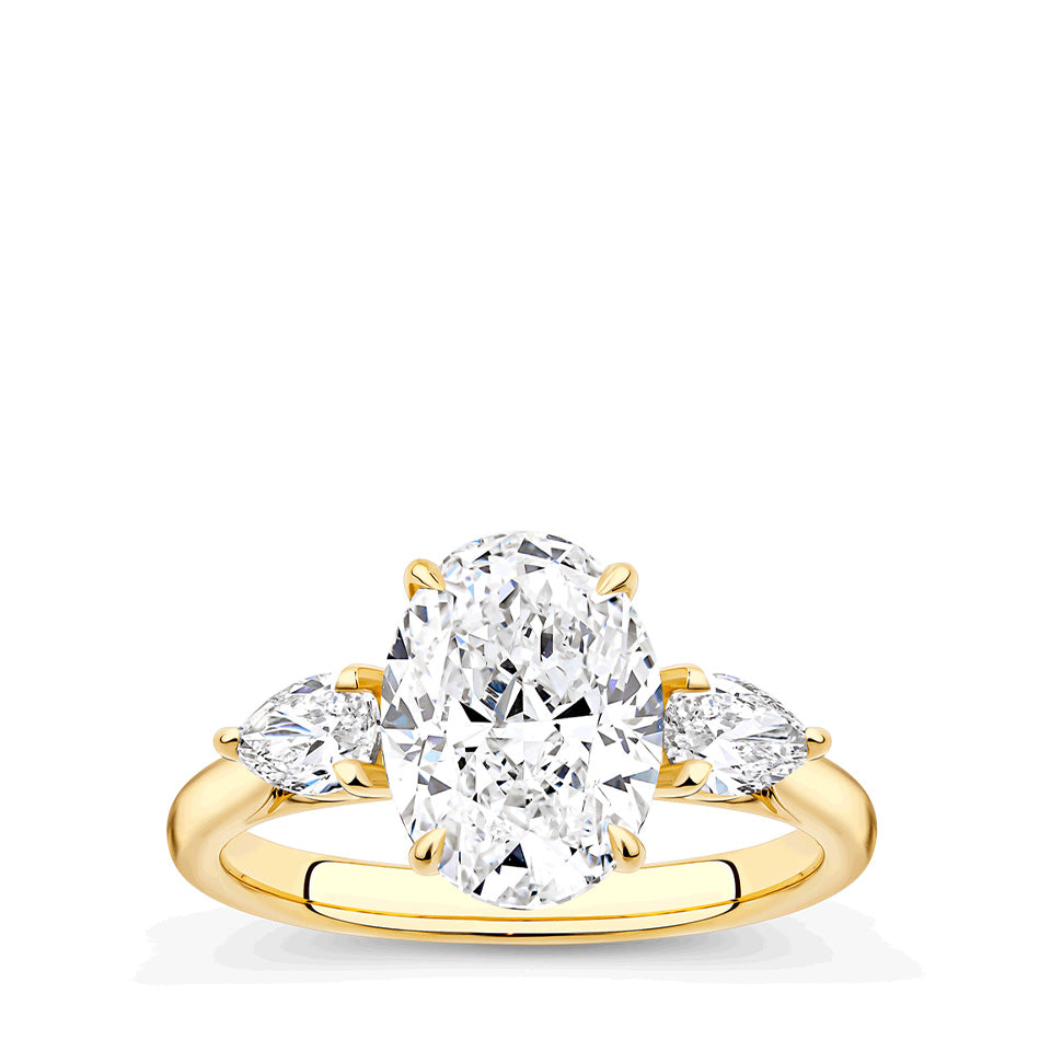 3.00 Carat Oval and Pear Cut Trilogy Engagement Ring in 18ct Yellow Gold