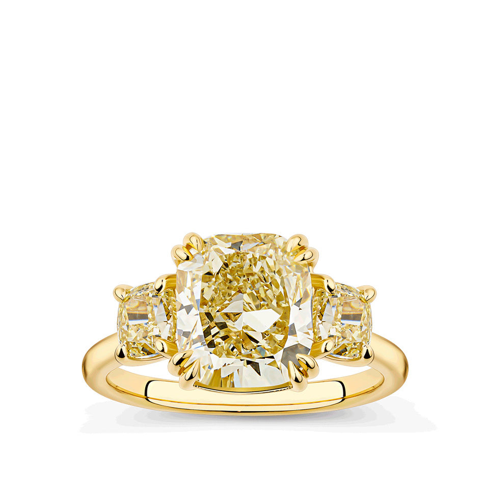 4.66 Carat Fancy Yellow Diamond Cushion Cut Trilogy Engagement Ring in 18ct Yellow Gold