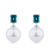 South Sea Pearl and Tourmaline Stud Earrings in 18ct white gold from Hardy Brothers Jewellers, shown front-on as a pair with a lagoon blue tourmaline stud and South Sea pearl drop on each earring.
