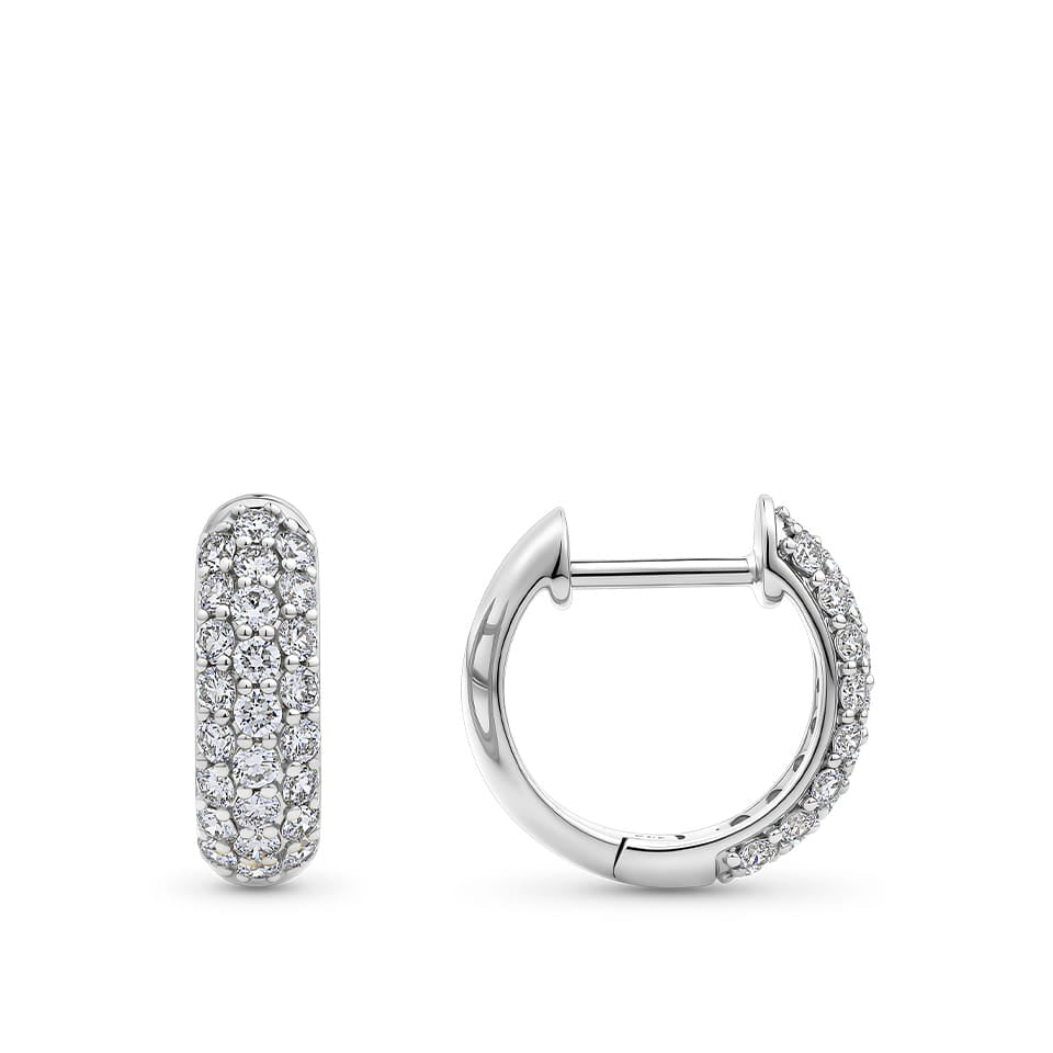 Pair of White Gold Huggie Earrings with Diamonds in a pave setting 