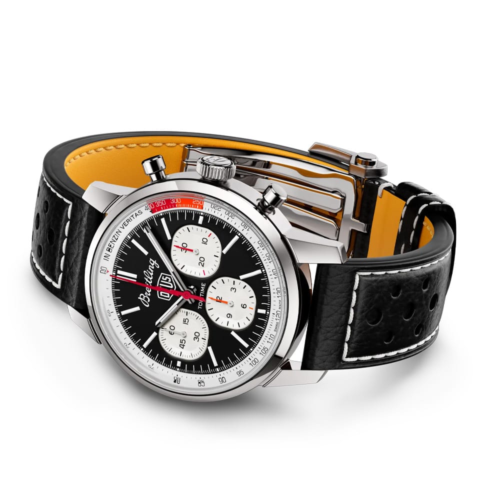 Breitling Top Time Deus B01 Chronograph 41mm Watch AB01765A1B1X1 reveals the perforated detail of its black calfskin racing strap, co-designed with Deus Ex Machina. The stainless steel folding clasp buckle carries a matching finish to the case.
