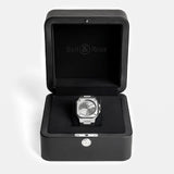 Bell & Ross BR-05 Automatic 40mm Watch BR05A-GR-ST/SRB is presented in its Bell & Ross packaging, ready for gifting or display. This 100m water-resistant timepiece pairs its 40mm steel case with a black rubber strap.