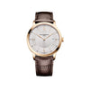 Front-facing view of the Baume & Mercier Classima M0A10857 men's watch, featuring a silvery opaline sun satin-finished dial with barleycorn pattern, 4N gold-tone Roman numerals and indexes, gold-tone leaf hands, date window at 3 o'clock, rose gold PVD stainless steel case, and a dark brown alligator-pattern calfskin strap.
