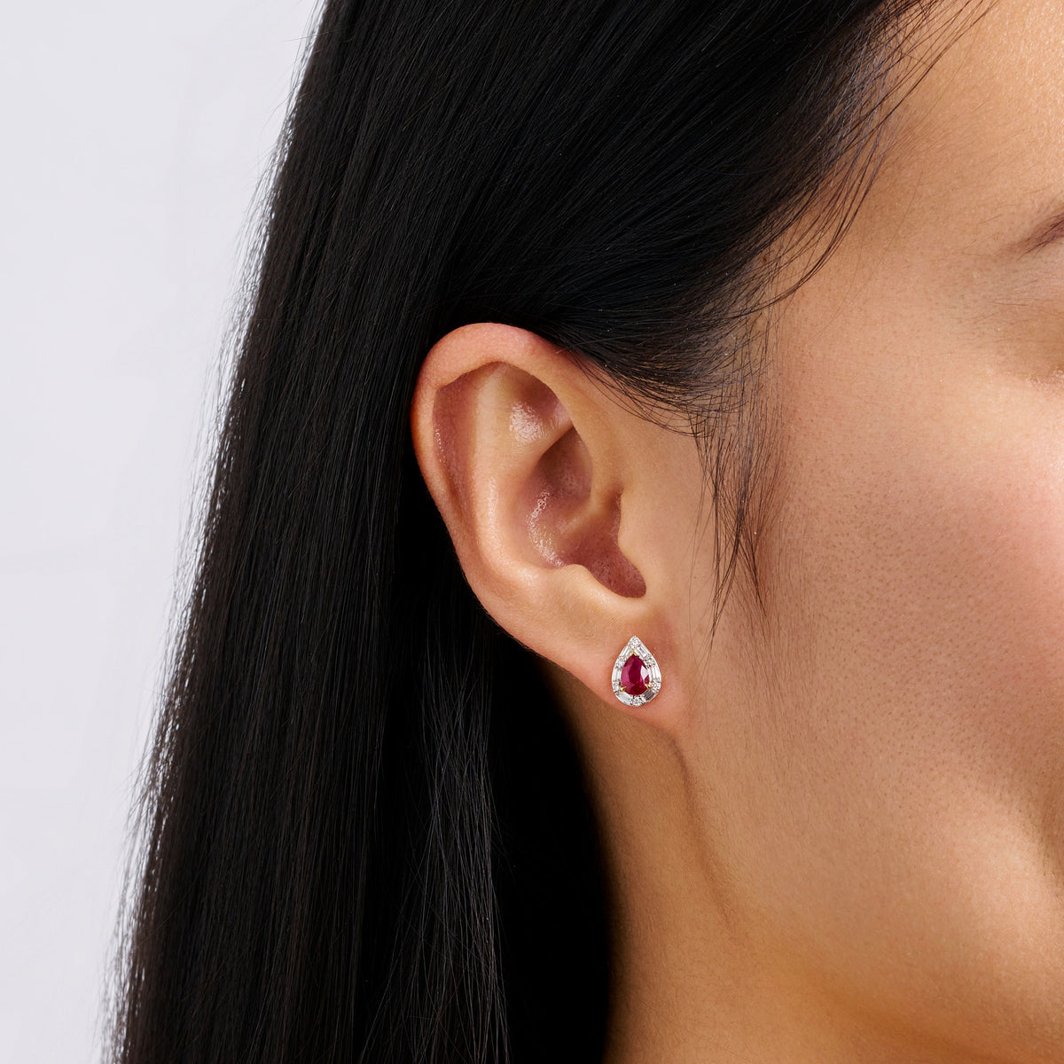 Pear Cut Ruby and Alternating Diamond Stud Earrings in 18ct Yellow and White Gold