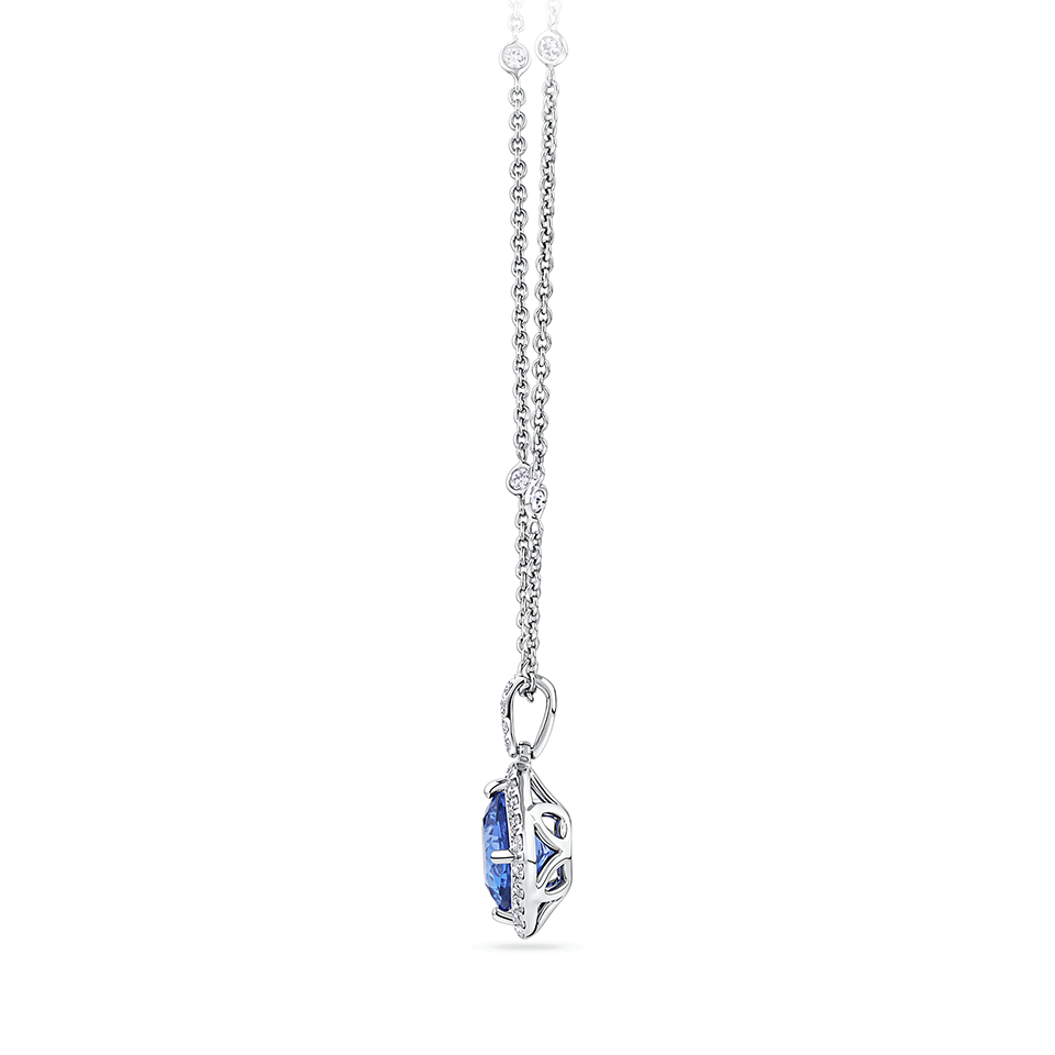 Tanzanite Cushion and Diamond Halo Pendant in 18ct White Gold