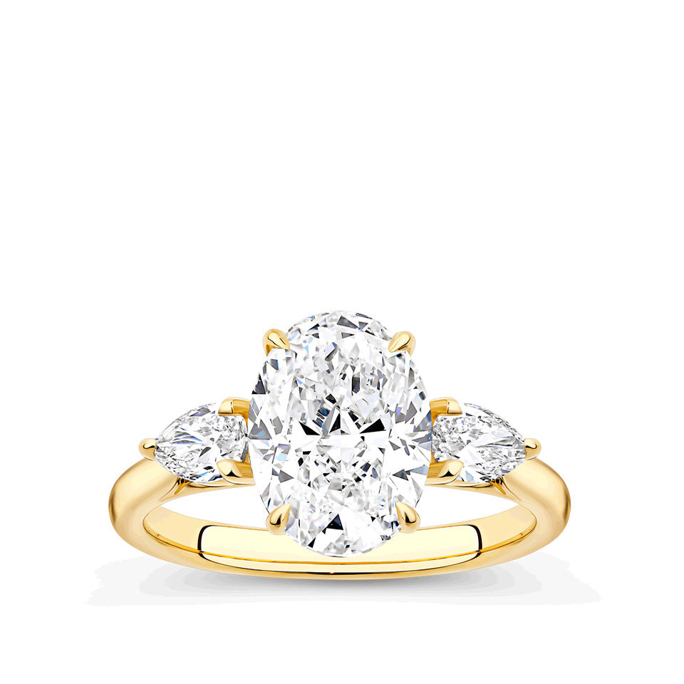 3.50 Carat Oval and Pear Cut Trilogy Engagement Ring in 18ct Yellow Gold
