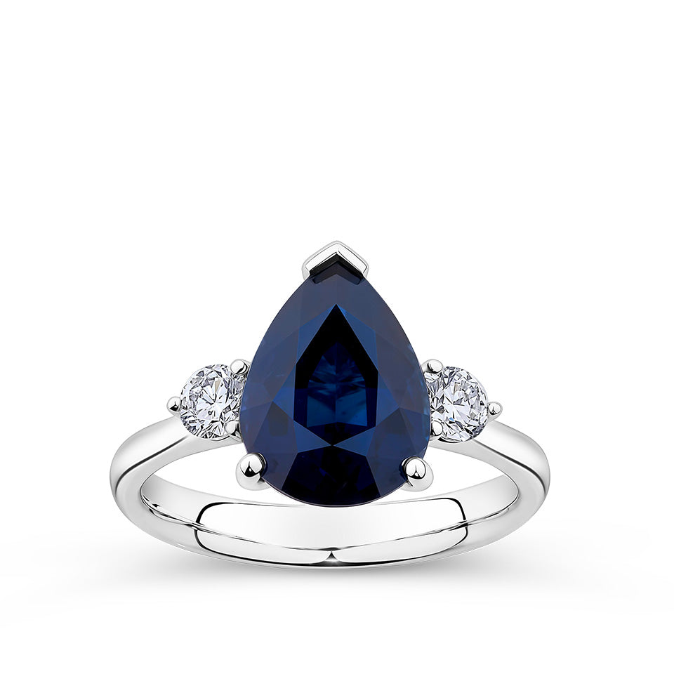 4.45 Carat Pear Cut Sapphire and 0.34 Carat Round Brilliant Cut Diamond Ring in 18ct White Gold