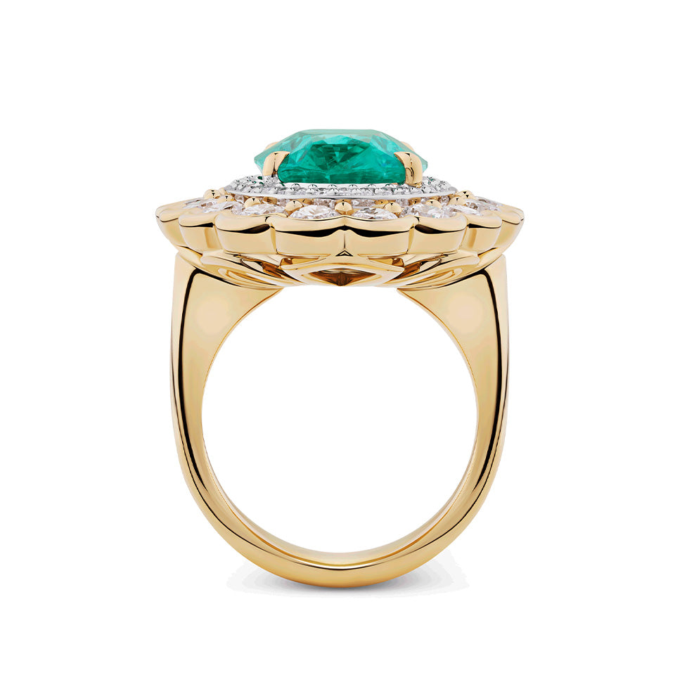 VAULT 7.55 CARAT OVAL CUT COLOMBIAN EMERALD AND 2.90 CARAT DIAMOND HALO RING IN 18CT YELLOW GOLD