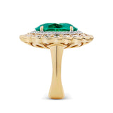 VAULT 7.55 CARAT OVAL CUT COLOMBIAN EMERALD AND 2.90 CARAT DIAMOND HALO RING IN 18CT YELLOW GOLD