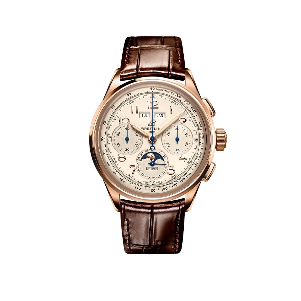 Breitling Premier B25 Datora 42mm Watch RB2510371G1P1 displays its cream dial with a complete calendar showing day, date and month alongside a moon-phase display. The 18k red gold case features rectangular chronograph pushers and Arabic numerals.