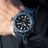 Bremont Supermarine Full Ceramic Deep Blue Automatic Men’s 43mm Watch SM43-DT-BLCER-BK-L-S worn on the wrist. The lightweight blue ceramic case sits on a blue embossed rubber strap with leather lining.