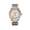 Breitling Navitimer Automatic 41mm Watch U17329F41G1U1 displays its cream dial with the intricate slide rule bezel that defines the Navitimer's iconic look. The notched bezel adds a contemporary touch to the stainless steel and 18k red gold case.