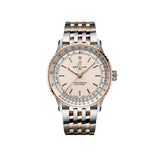 Breitling Navitimer Automatic 41mm Watch U17329F41G1U1 displays its cream dial with the intricate slide rule bezel that defines the Navitimer's iconic look. The notched bezel adds a contemporary touch to the stainless steel and 18k red gold case.