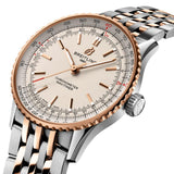 Breitling Navitimer Automatic 41mm Watch U17329F41G1U1 shows the alternating polished and brushed finishes from an angled perspective. The stainless steel and 18k red gold bracelet connects seamlessly to the 41mm case.