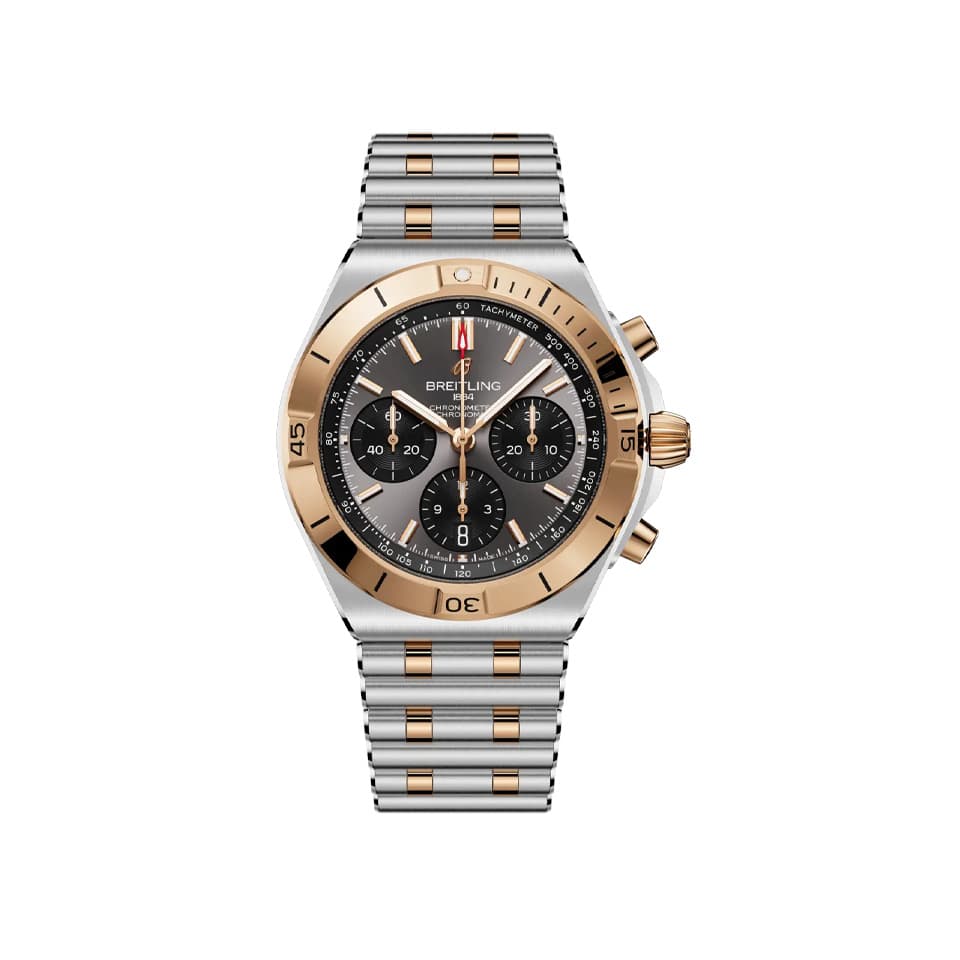 Breitling Chronomat B01 Chronograph 42mm Watch UB0158101B1U1 — front view showing black dial with 18k red gold accents on two-tone stainless steel and gold Rouleaux bracelet