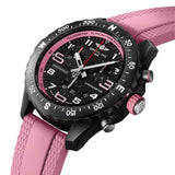 Breitling Endurance Pro Quartz Chronograph 38mm Watch X83310D41B1S1 shows the sapphire crystal and textured Breitlight® finish from an angled perspective. The pink rubber strap curves into the 38mm case for an athletic, everyday-wear profile.
