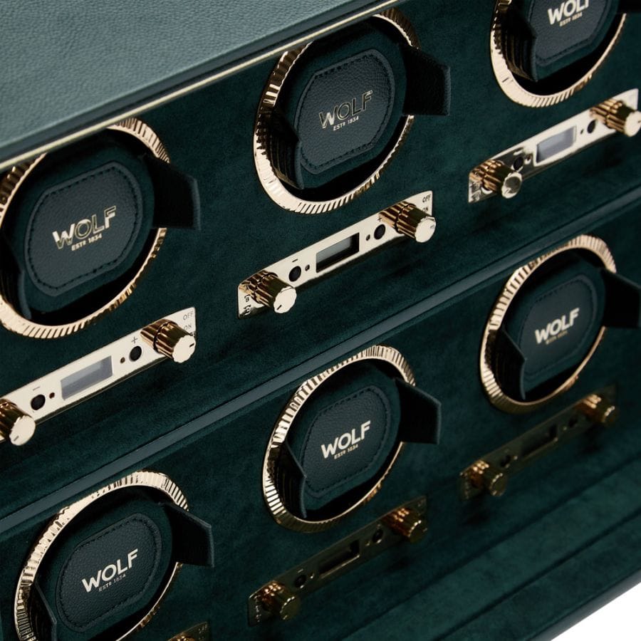 WOLF British Racing Green 6 Piece Watch Winder, item 792441, showing a winding module up close. The patented lock-in cuff holds each watch securely without putting pressure on the bracelet.