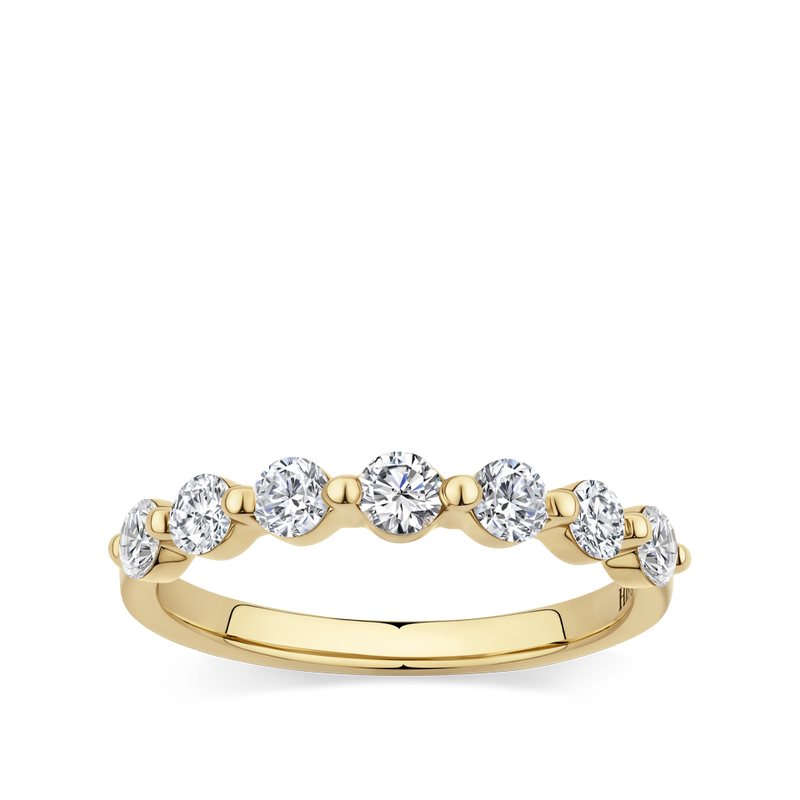 Floating diamond wedding online band yellow gold