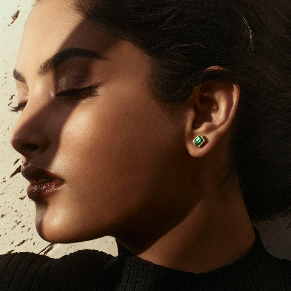 Green and 2025 gold earrings