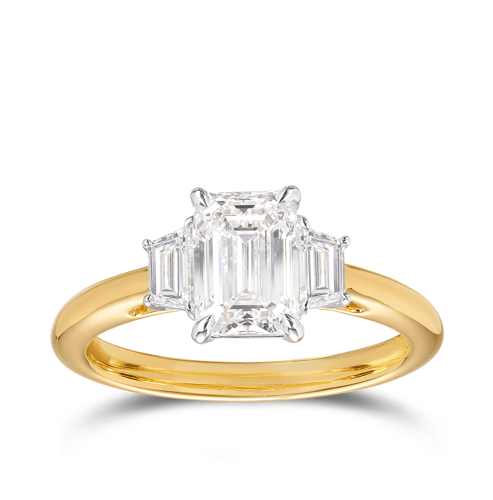 1.50 Carat Emerald Cut and Trapezoid Diamond Trilogy Engagement Ring in 18ct Yellow Gold Hardy Brothers 