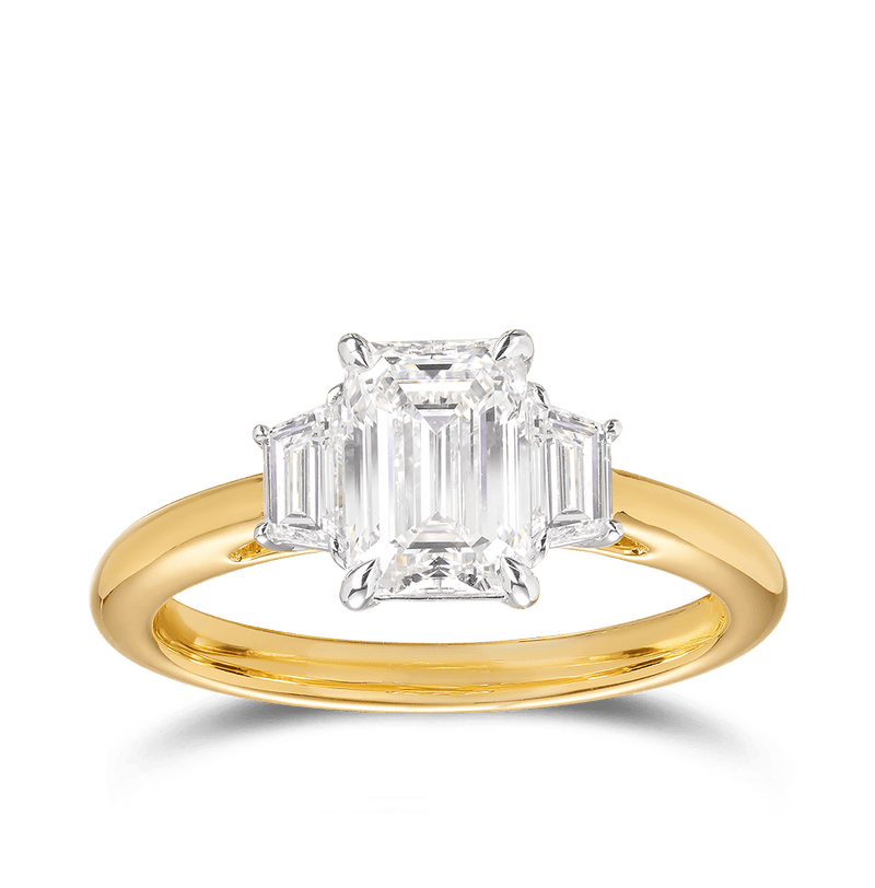 1.50 Carat Emerald Cut and Trapezoid Diamond Trilogy Engagement Ring in 18ct Yellow Gold Hardy Brothers 